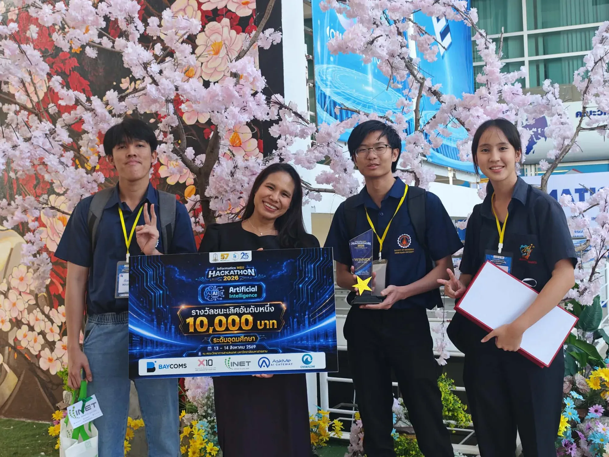 The team holding the AI track winner board at Informatics MSU Hackathon 2026
